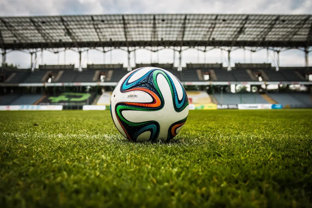 Sports Sections Soccer Ball on Stadium Field